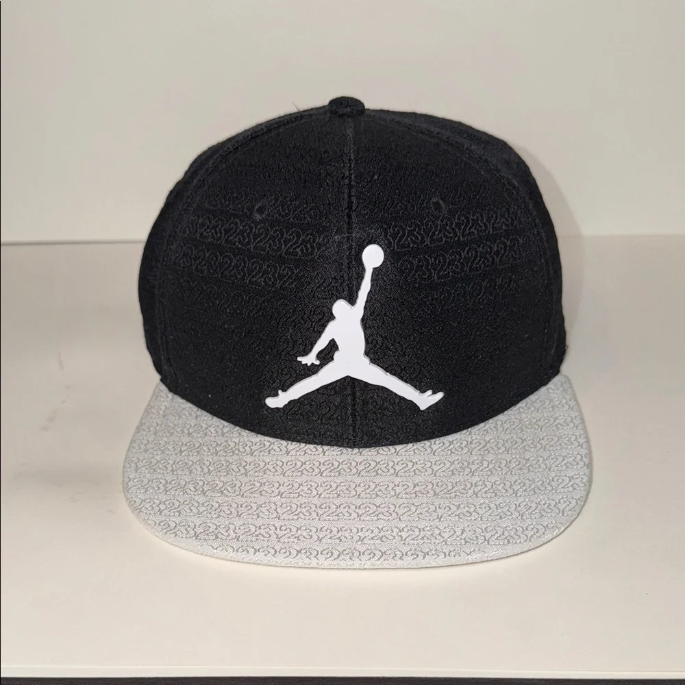Jordan Big Boys All Over 23 Print Elite Snapback Hat Black White Jacquard Cap